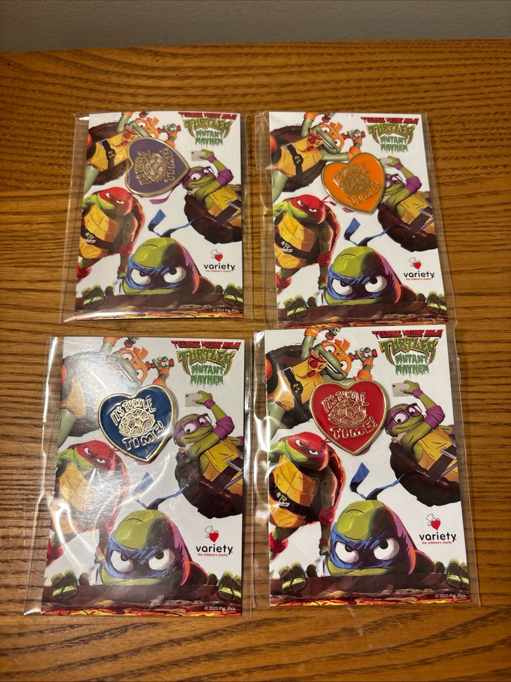 Teenage Mutant Ninja Turtles Heart Enamel Pin Set - Red, Orange, Purple, Blue